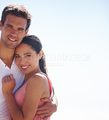 Buy stock photo Couple, portrait and hug outdoor with sky background, love and care with happiness together for travel. Safety, security and trust, comfort or support with people in healthy relationship for romance