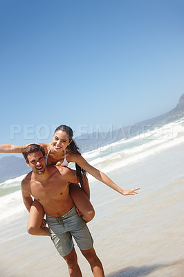 Buy stock photo Couple, piggyback and portrait on beach with playing for bonding, summer vacation and anniversary getaway. Man, woman and love by ocean with mockup space for freedom, healthy relationship or blue sky