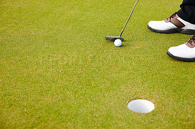 Buy stock photo Feet, club and golf ball for hole on field, training and practice for competition or tournament. Closeup, shoes and target for outdoor challenge and exercise, person and professional athlete on lawn