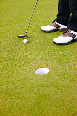 Buy stock photo Feet, club and ball for hole on golf course, contest and practice for competition or tournament. Closeup, shoes and target for outdoor challenge and exercise, game and athlete for international match