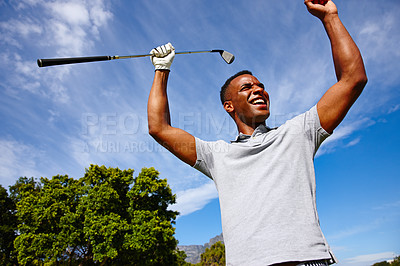 Buy stock photo Shot of a young man celebrating his golf shot