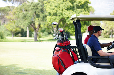 Buy stock photo Men, friends and driving golf cart on outdoor field for fitness, clubs and people for sport or exercise. Golfer, athlete and vehicle on green grass for workout, fun and transportation on arena