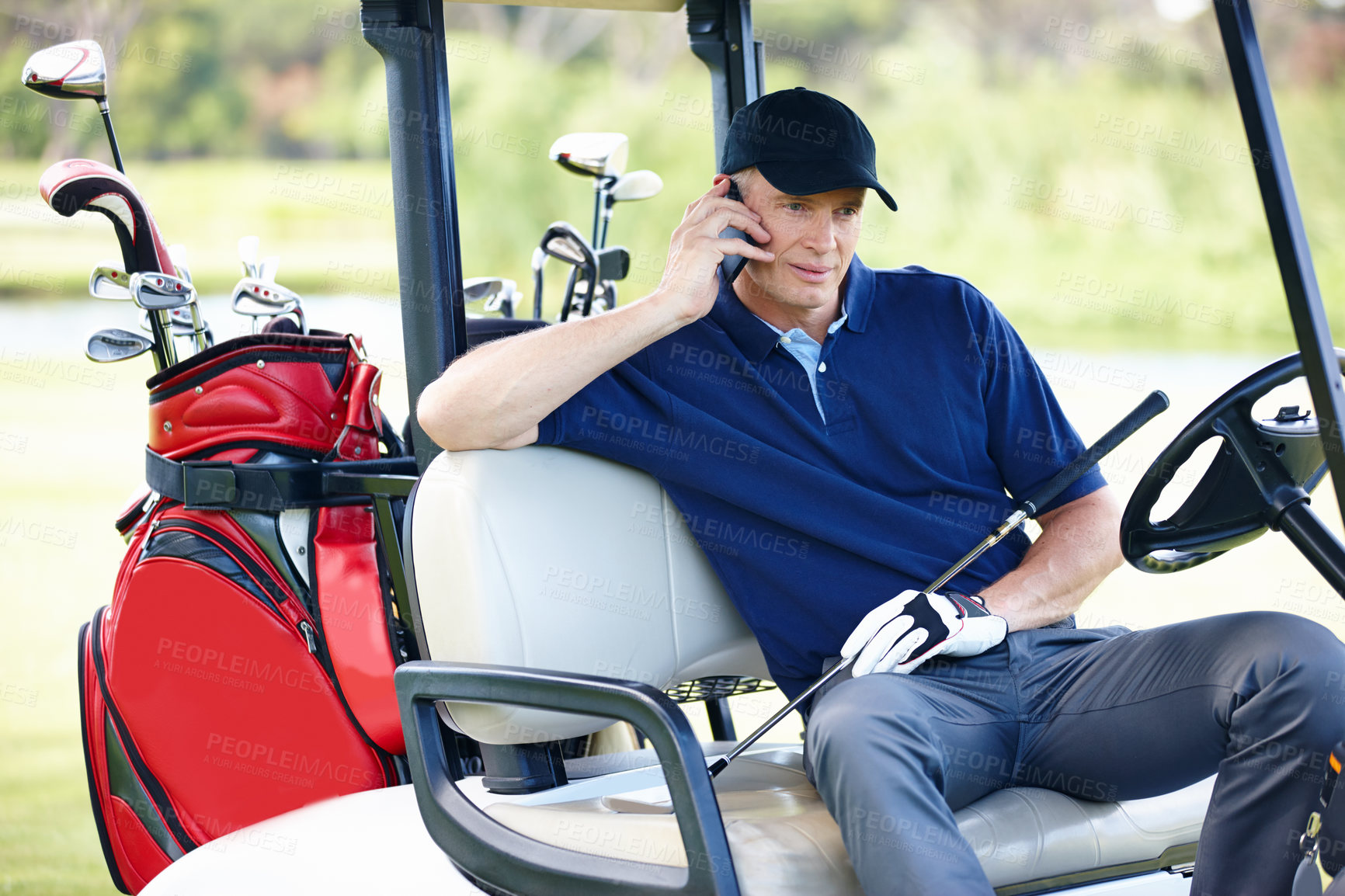 Buy stock photo Man, phone call and talking in golf cart for networking, communication and planning for schedule. Male person, talking and athlete outdoors on tech, golfer and sports on field or training on lawn