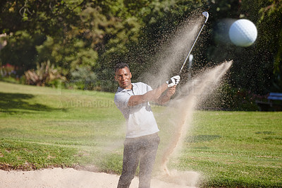 Buy stock photo Man, golf ball and swing with sand for sports, action and energy with club for game, competition and focus. Challenge, exercise and professional athlete with training, performance and leisure outdoor