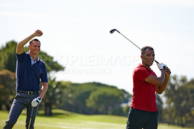 Buy stock photo Shot of two handsome men playing a game of golf