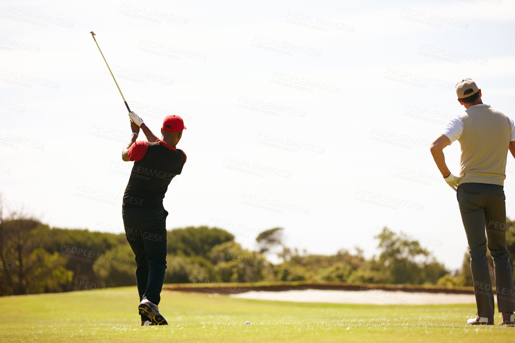 Buy stock photo Man, golfer and friends with club on golf course for stroke, point or strike on grass field in nature. Male person, sports player or team hitting ball for friendly game, match or outdoor competition