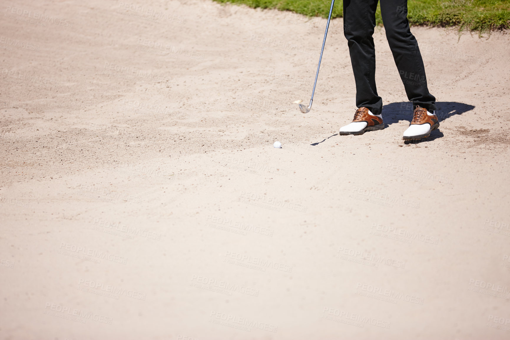 Buy stock photo Golf, club and bunker with ball for shot with closeup of legs on pitch for recreational hobby. Sport, driving range and sand with man on course for accuracy with practise for skill development