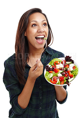 Buy stock photo Woman, eating and salad for health in studio, benefits and vegetables for nutrition on white background. Female person, organic and pride for detox or minerals on diet, weight loss and vitamins