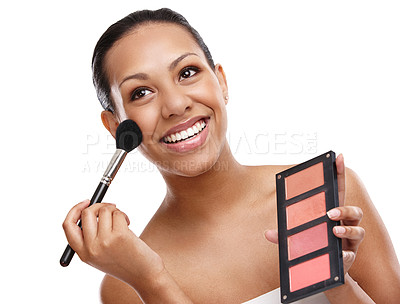 Buy stock photo Cropped shot of a beautiful young woman applying blush to her face while standing in studio-isolated on white 