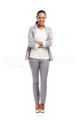 Buy stock photo Full length shot of an attractive young woman standing in a studio with her arms crossed 