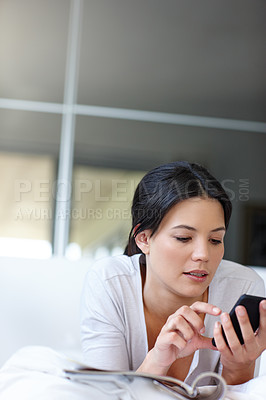 Buy stock photo Woman, smartphone and check text in bedroom for social media, technology and internet communication. Female person, mobile phone and looking online in house for magazines, website and search 
