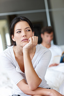 Buy stock photo Woman, hand and thinking in bedroom with stress for breakup, dating problems and tension. Female person, thoughtful and sadness at home with upset, frustrated and unhappy for relationship trouble
