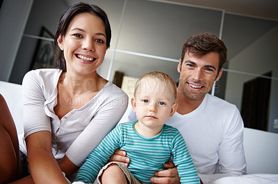 Buy stock photo Parents, son and portrait on bed for morning in home, smile and proud of family and love or bonding. People, boy and happy for child development, care and weekend together for connection on vacation