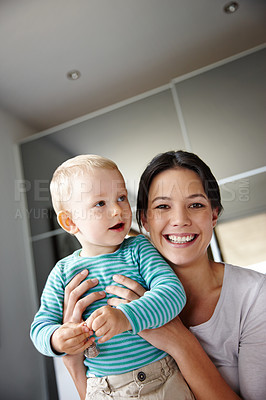 Buy stock photo Mommy, child and portrait for love in hug and home, smile and security in support for connection. Happy mother, son and embrace for bonding in apartment, peace and calm or single parent for comfort