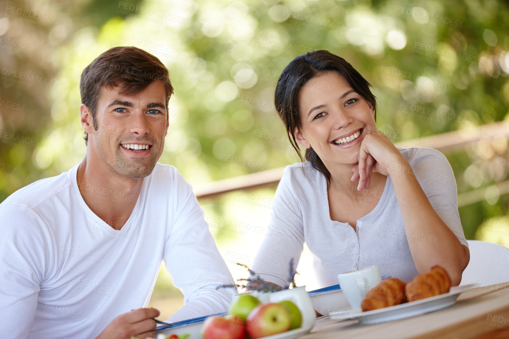 Buy stock photo Couple, breakfast and outdoors portrait for eating, love and affection in marriage or romance in nature. People, nutrition and smile at home for healthy relationship, food and relax on vacation