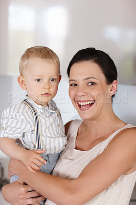 Buy stock photo Woman, child and portrait in house with smile, development and happiness for love, youth and care indoor. Mother, young boy or holding kid and happy for bonding together, family and cute on weekend 