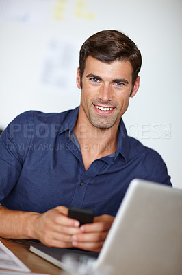 Buy stock photo Portrait, businessman and office with laptop, smartphone and desk for strategy, planning, research and ideas for project. Professional, person and working on computer for finance report on company