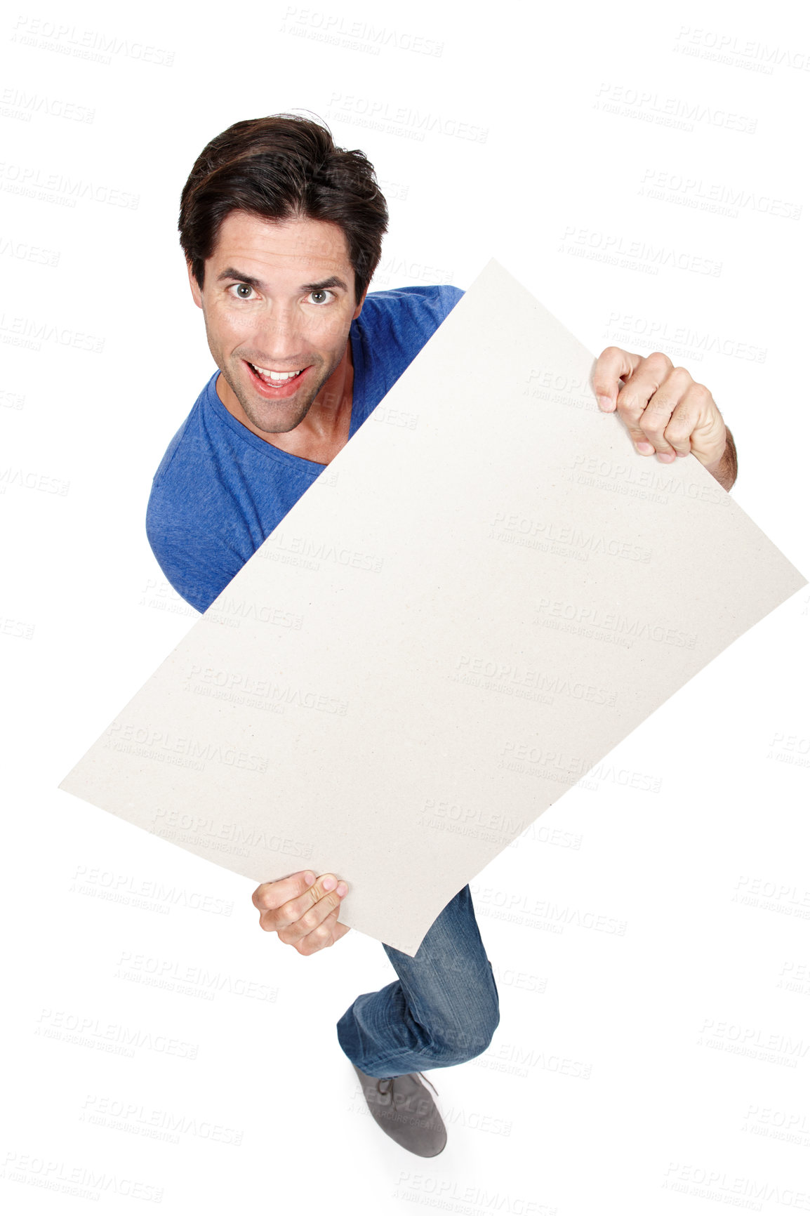 Buy stock photo Portrait, poster or happy man with a board for promotion, marketing or advertising deal in studio. Above, offer or male person with blank mockup space or paper isolated on white background for sales