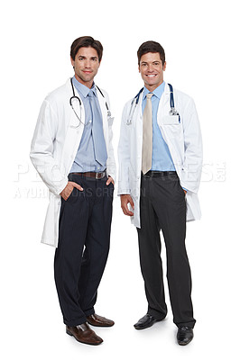 Buy stock photo Studio shot of two young doctors standing