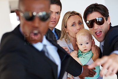 Buy stock photo Portrait, man and bodyguard with sunglasses for safety support, fear, and security service. Threat, family protection and face of male employee with client privacy, danger control and scared woman
