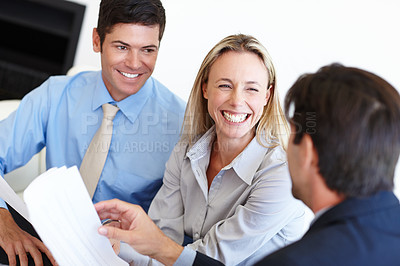 Buy stock photo Businesspeople, colleagues or documents with smile or closeup in office, laugh and conversation or talking. Group of people, auditors or workplace or happy with discussion or financials, paper or joy