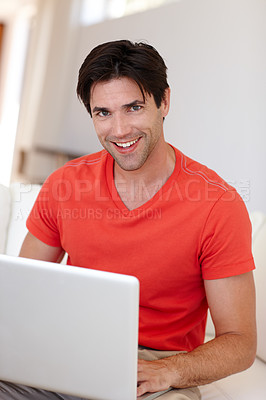 Buy stock photo Portrait, man and laptop in home for remote work with internet connection, happy and typing. Website, telework and face of male freelancer in living room with technology for working, smile and online