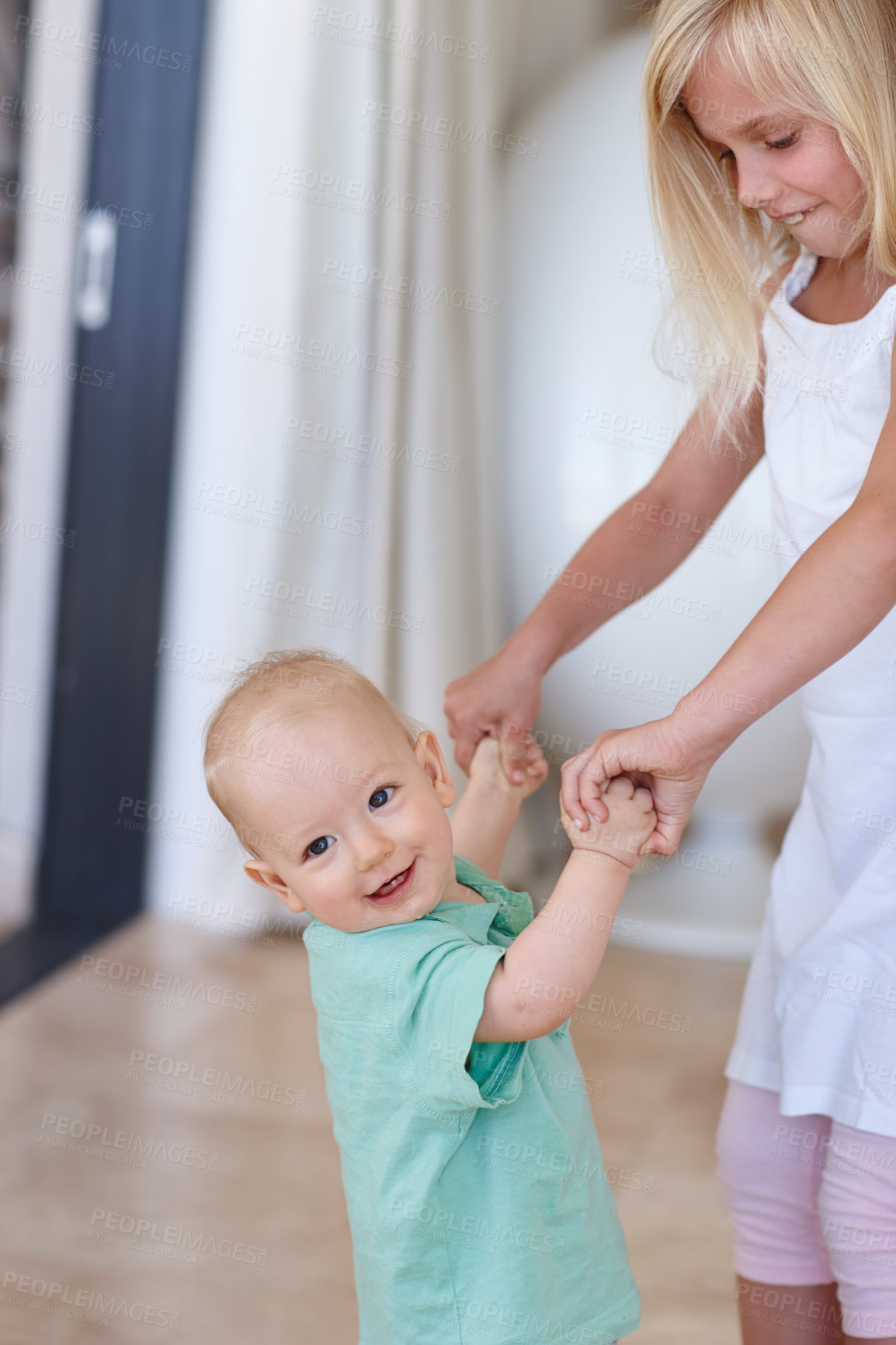 Buy stock photo Siblings, girl and portrait of toddler, dancing and holding hands to play in home with happiness. House, child and growth of development, brother and sister with love, fun and bonding as family