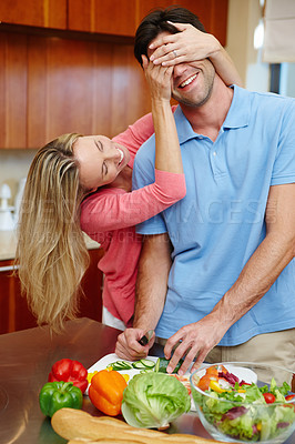 Buy stock photo Happy, man and woman in cooking, smile and cheerful in kitchen at home for dinner, plans and family. Married couple in preparing, food or salad for healthy, eating and nutrition in house with love