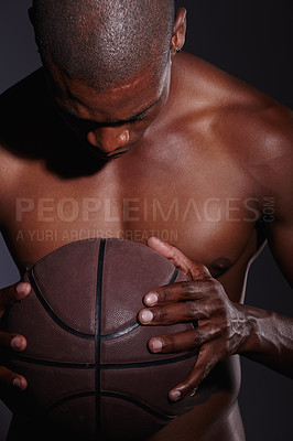 Buy stock photo Black man, basketball and strong by black background for fitness motivation, wellbeing and workout. Physical activity, topless and male athlete in studio with exercise for health, wellness and game