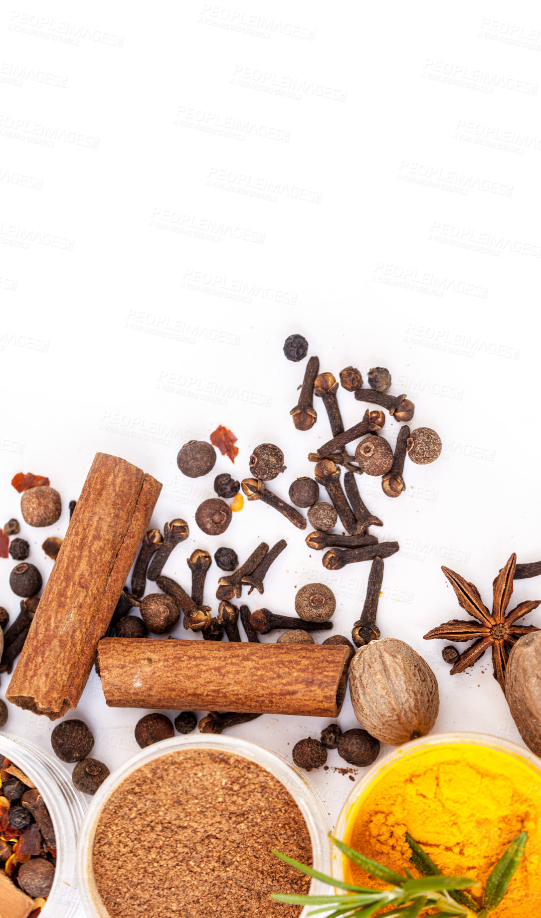 Buy stock photo Table top, powder and food spices in studio isolated on white background mockup. Turmeric seasoning, kitchen condiments and variety of plant herbs in bowls for brunch, healthy diet or cooking flavor.