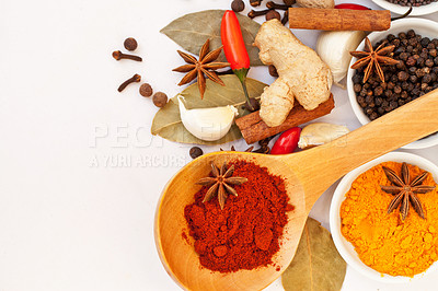 Buy stock photo Powder, table top and food spices in studio isolated on white background mock up. Turmeric seasoning, kitchen cooking and variety of leaf herbs in bowls for brunch, healthy diet and paprika in spoon.