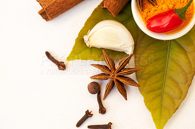 Buy stock photo Spices, herbs flat lay of organic ingredients for cooking or cinnamon or garlic or taste in food and on a white background. Nutrition, diet and coriander for seasoning  and natural chilli in studio