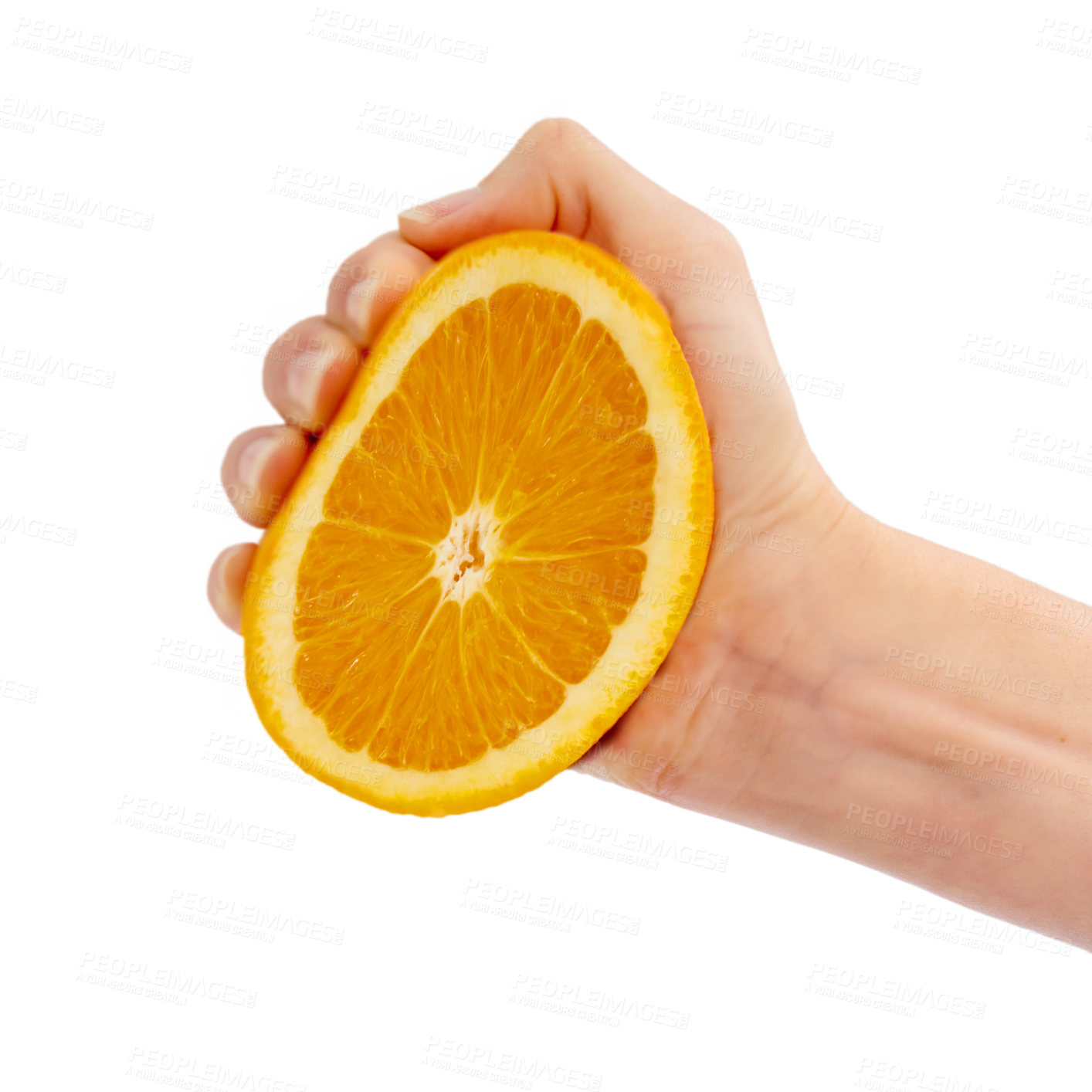 Buy stock photo Cropped studio shot of a person squeezing half an orange in their hand