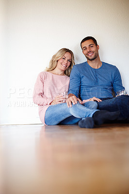 Buy stock photo Happy couple, portrait and sitting on living room floor in new house for memories, drinks and home renovation. Dreaming,  apartment and decision for decoration, interior design and future planning. 