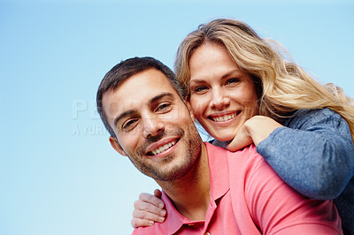 Buy stock photo Couple, portrait and outdoor piggyback by blue sky, together and care for bonding in embrace. People, support and hug on holiday or vacation in nature, low angle and commitment on mockup space