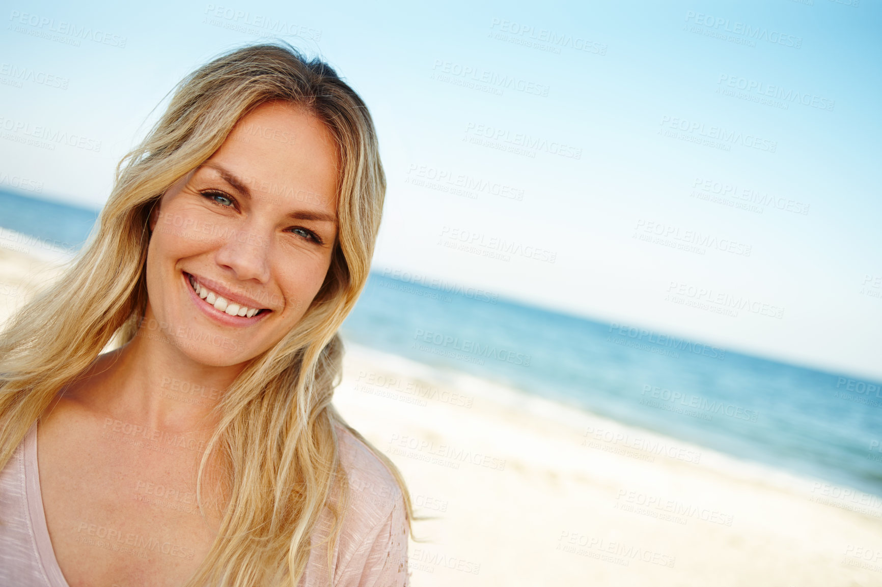Buy stock photo Woman, portrait and beach in summer with smile for vacation with travel in sunshine for holiday in maldives. Female person, ocean space and nature to relax for peace with happiness and confidence