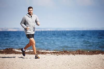 Buy stock photo Sporty man, outdoor and running for exercise, health and wellness in nature for workout or fitness. Male athlete, training and cardio with endurance, muscles and strength for healthy living or gym