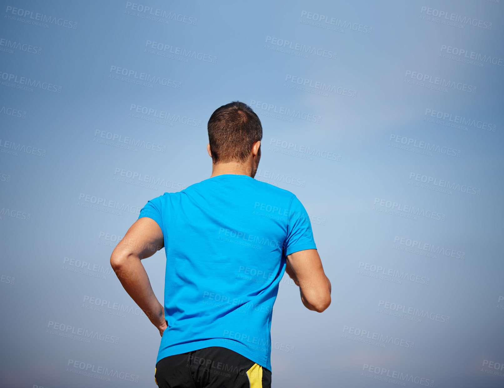 Buy stock photo Man, running and blue sky in morning for fitness, exercise and health or sport . Athlete, jog and outdoor in nature with speed for motivation, wellness and cardio workout or cardiovascular training