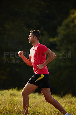 Buy stock photo Man, woods and trail running outdoors with athlete for endurance with physical fitness for training. Male person, back and cross country for workout routine, race and drill for performance in balance