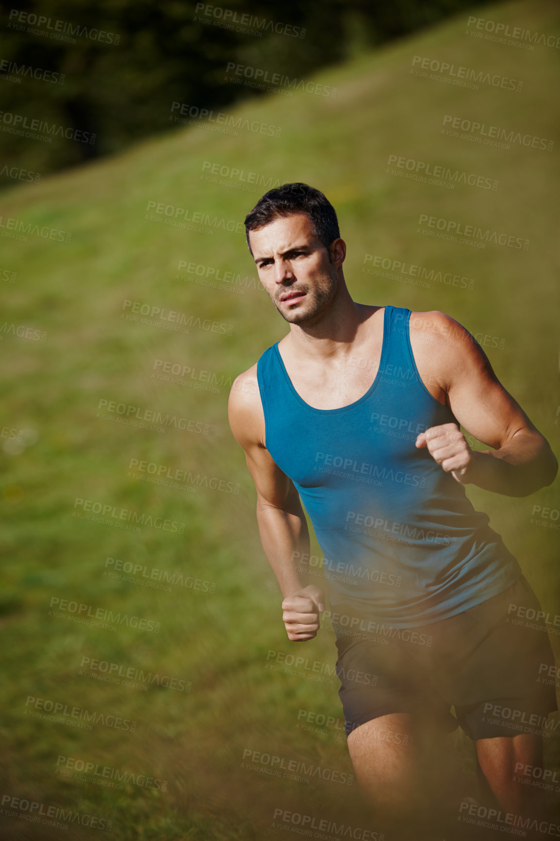 Buy stock photo Male athlete, fit and jogging in outdoor for fitness, health and wellness in nature for workout or exercise. Sporty man, training and cardio with endurance, muscles and strength for healthy living