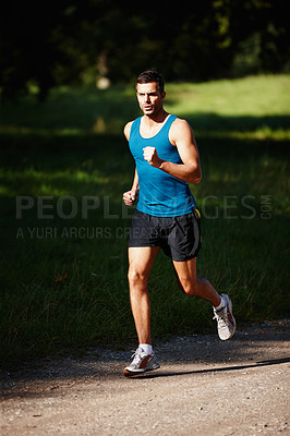 Buy stock photo Runner, man and sports in nature for fitness, health and wellness in outdoor for workout or exercise. Male athlete, training and cardio with endurance, muscles and strength for marathon or challenge