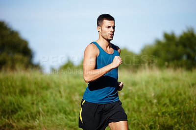 Buy stock photo Running, man and training in outdoor for fitness, health and wellness on beach for workout or exercise. Male athlete, strength and cardio with endurance, muscles and jogging for sports or marathon