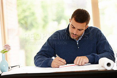 Buy stock photo Man, house and architect with plan for design in office, documents and drawing on blueprint. Male person, drafting and engineer for building idea on paper, solution and pen for project at desk