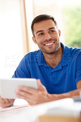 Buy stock photo Tablet, freelancer and man in home office for remote job, work or planning for creative project. Smile, male person and entrepreneur with technology for networking, information or browsing website