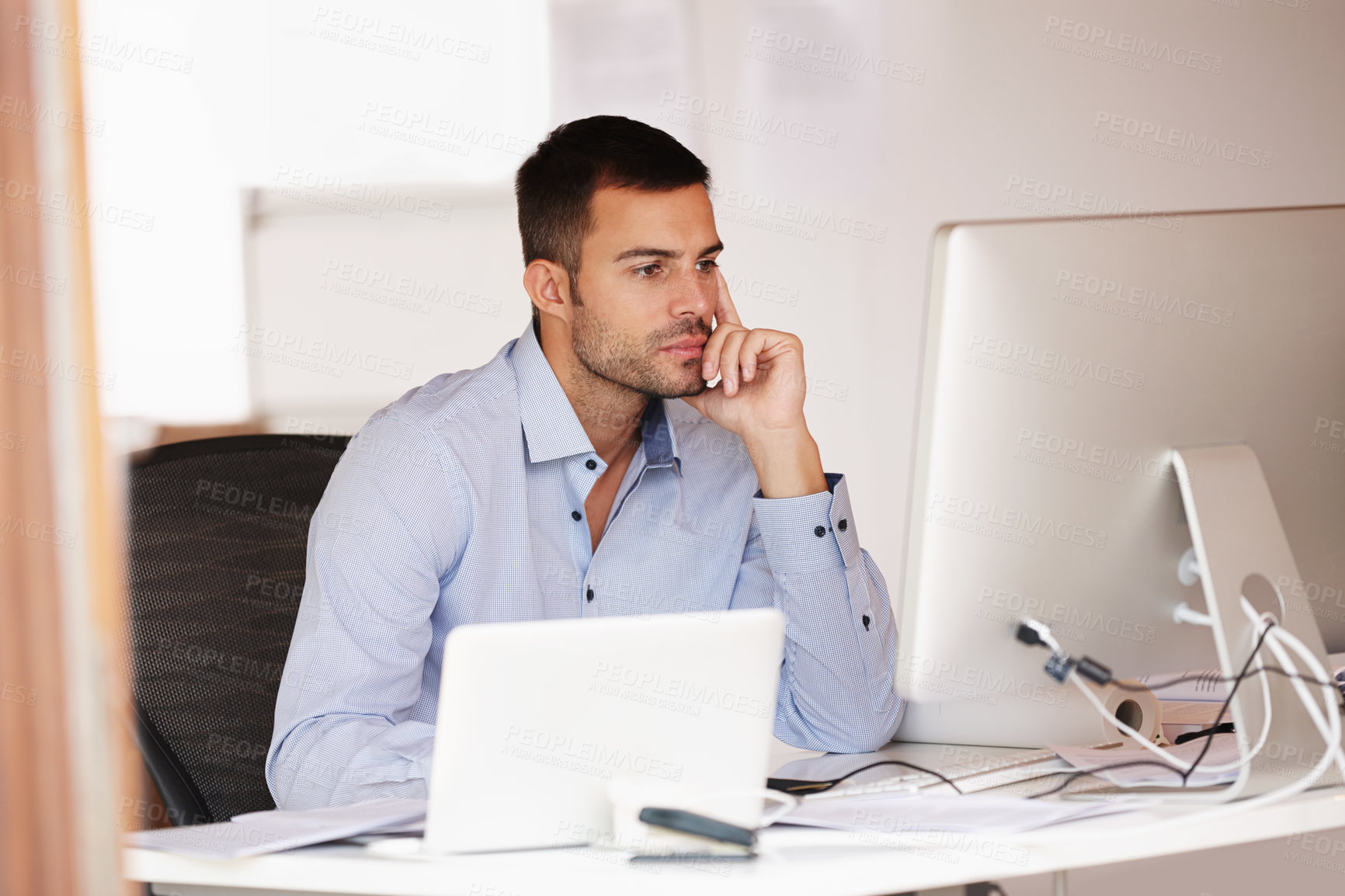 Buy stock photo Businessman, thinking and computer at desk in home office for start up company, freelance and software designer. Online, communication and brainstorming in house for plan, project and web development