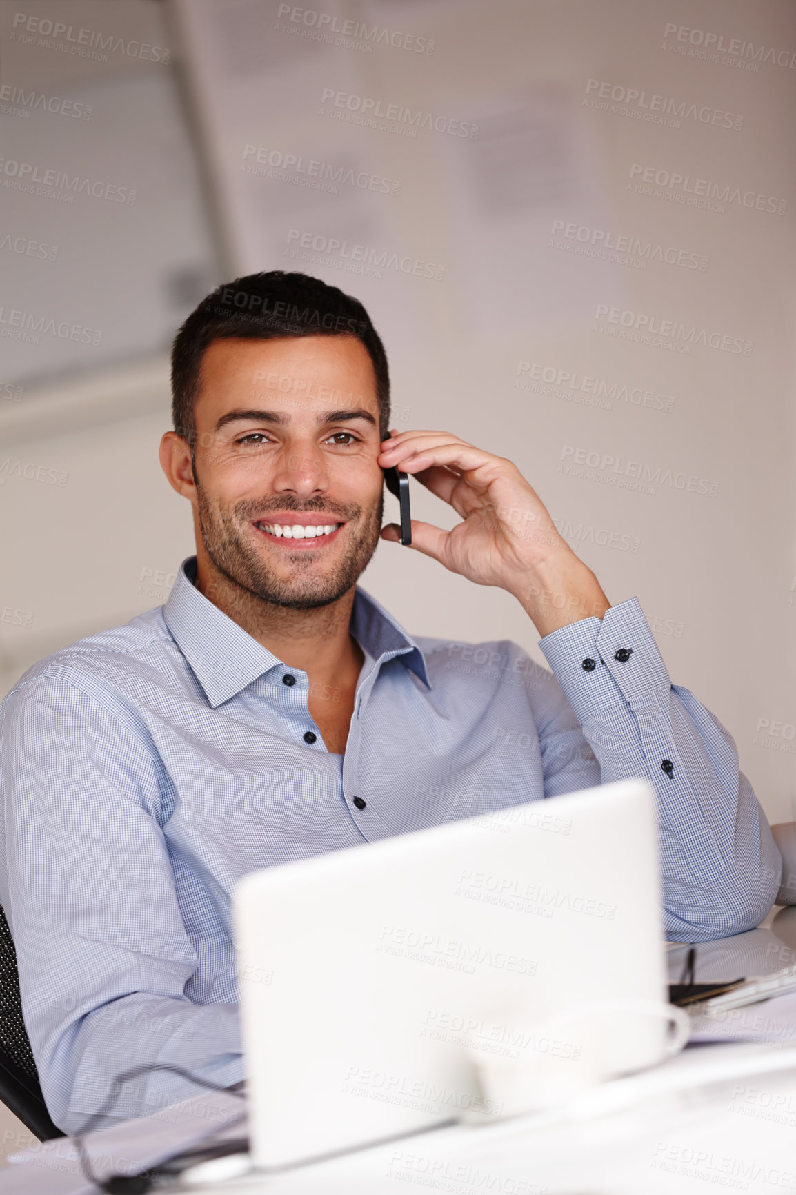 Buy stock photo Man, smile and phone call in office for networking, laptop and business deal negotiation. Happy male person, schedule and app for conversation or talking, internet and connection for planning agenda