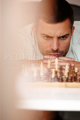 Buy stock photo Chess, man and thinking for strategy, stressed and problem solving for games and concentration. Face, planning and choice for play on board, challenge for mind and player to move piece on boardgame