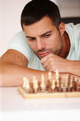Buy stock photo Chess, man and concentration for strategy, thinking and problem solving for games. Face, planning and choice for play on board, hobby and challenge for mind and player to move piece on boardgames