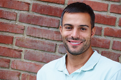 Buy stock photo Portrait, happy man and fashion by brick wall with shirt for fashionable stylish or cool clothes. Confident, model and male person with smile or relax for positive attitude in urban city of Italy