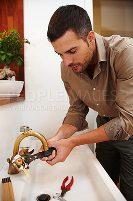 Buy stock photo Faucet, wrench and handyman for maintenance, plumber and home improvement for bathroom or house. Manual labour, tools and sink with equipment, renovation and household construction for repair